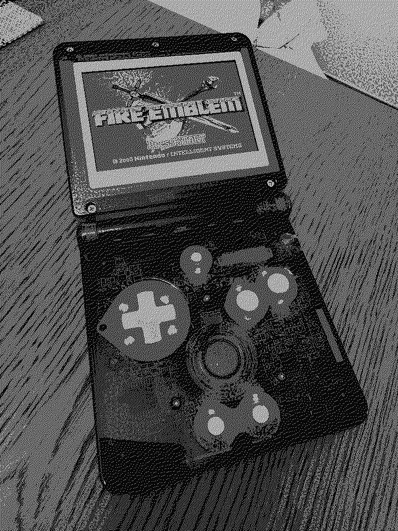 A GBA SP showing the Fire Emblem title screen with a transparent purple case and back lighting.