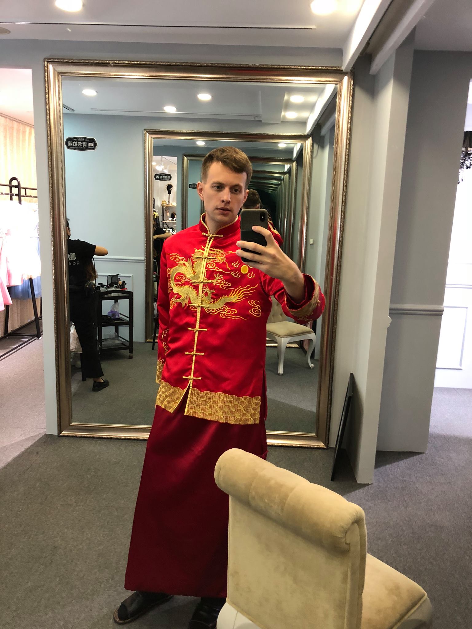 The face of a guy getting married in a foreign country